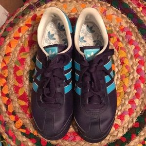 Purple and turquoise Adidas Samoa